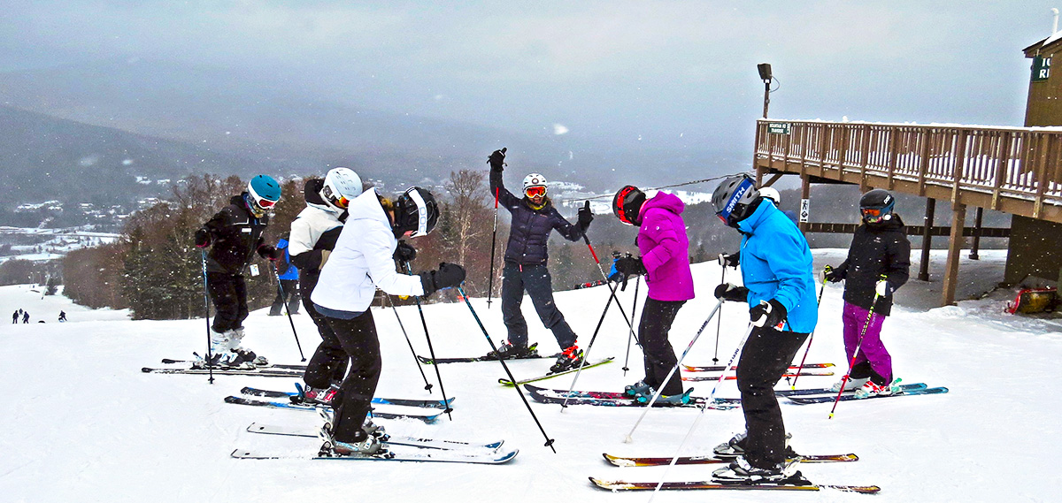 Miki Fera leads a group of women skiers at Bretton Woods